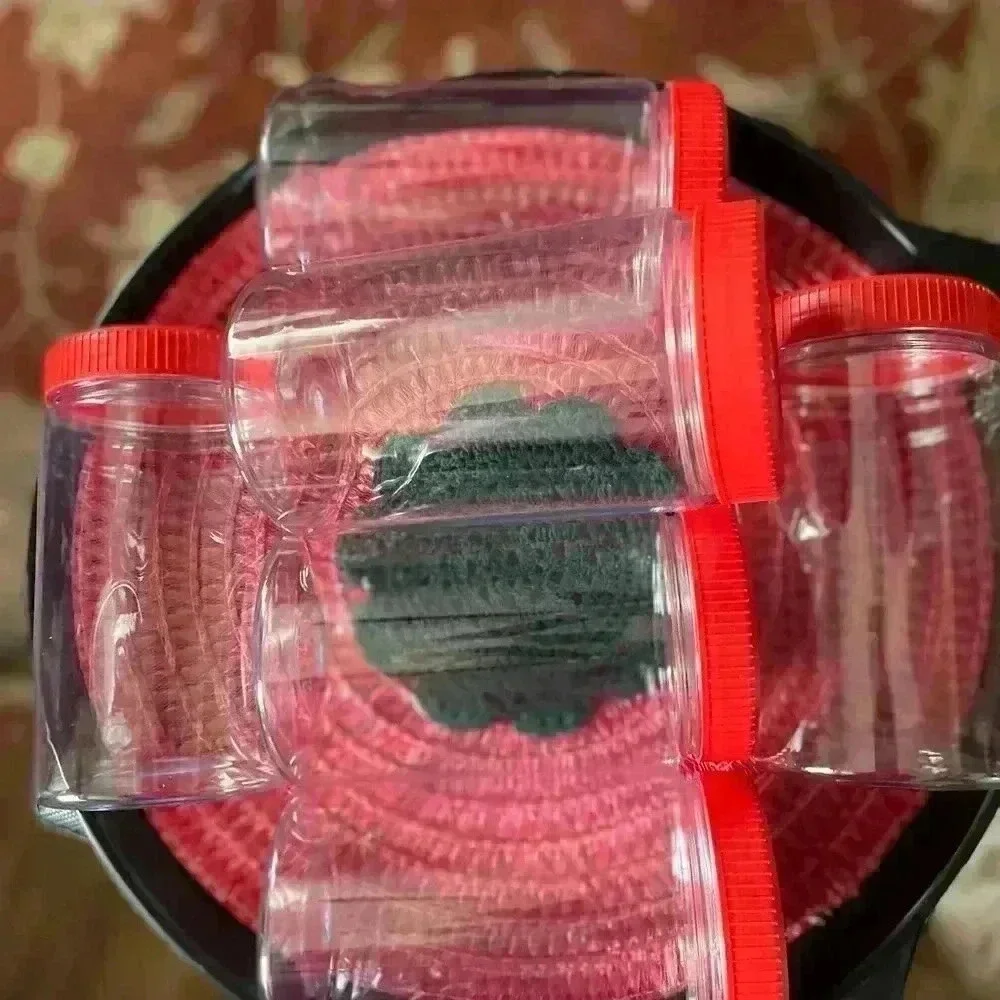 Set of 6 plastic containers clear with red lid 6.5 in height 11.5 width of jar